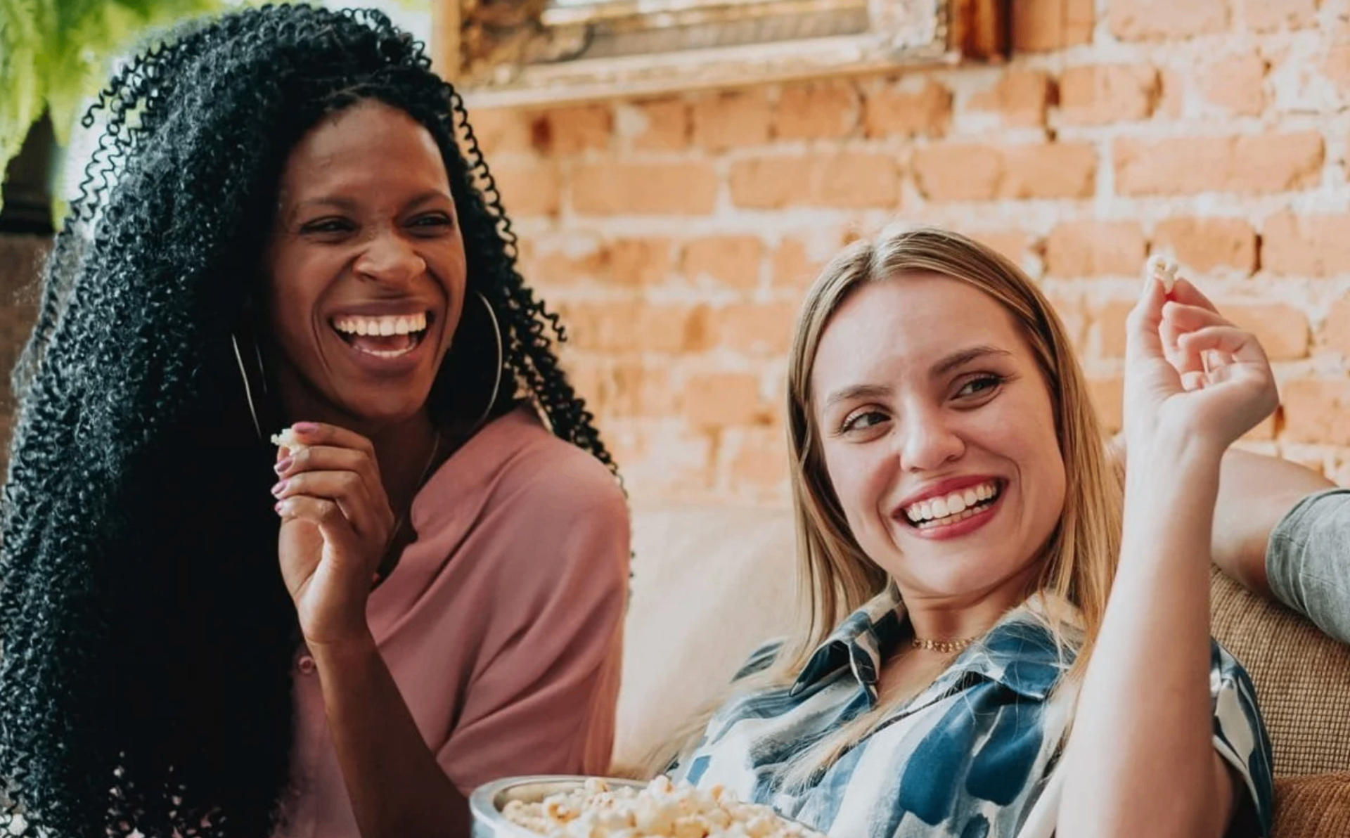 Women laughing and eating together - Eat in Peace